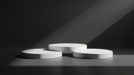 Fototapete - Three white circular platforms arranged on a dark surface with dramatic lighting casting shadows, creating a minimalist and modern aesthetic.
