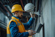 © ValNik Creations - Installation of cctv camera. Technician installing CCTV camera for security. CCTV camera closeup. A video surveillance camera in the hands of a technician. Installation of outdoor video surveillance