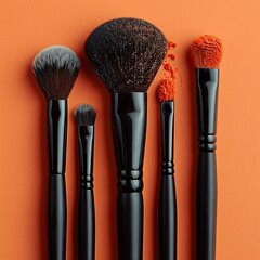 Radiant display: Makeup brushes on an orange backdrop.