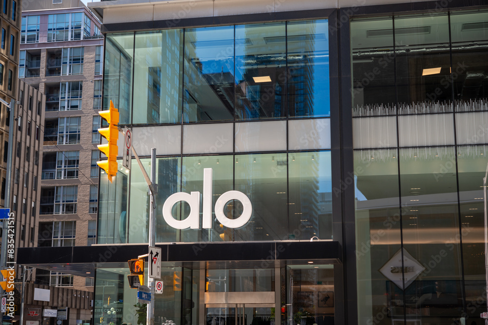 exterior facade and sign of Alo, a women's clothing store, located at ...