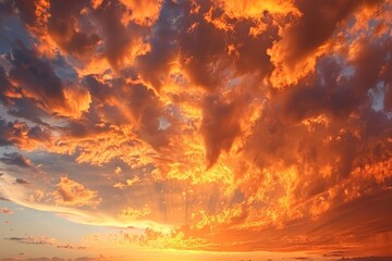 Wall Mural - breathtaking sunset sky vibrant orange clouds parting nature photography