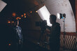 © Anna - Director of photography with a camera in his hands on the set.