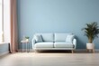 © free - Interior home of living room with blue sofa and green plants on pastel blue wall copy space, plywood floor