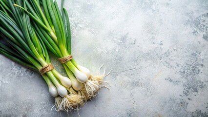 Top view of fresh spring onions on a light background with copy space, spring onions, fresh, green, vegetables, top view, organic, healthy, cooking ingredient, culinary, farm fresh
