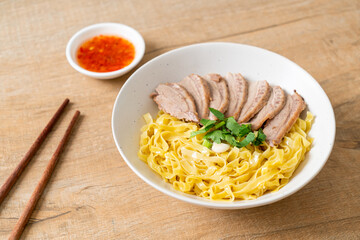 Sticker - dried duck noodles in white bowl