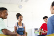 © Wavebreak Media - Diverse teenagers engage in a group discussion at high school