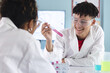 © Wavebreak Media - Teenage biracial boy and teenage girl in a high school lab