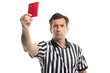 © Big - the referee in black holds up a red card isolated on background