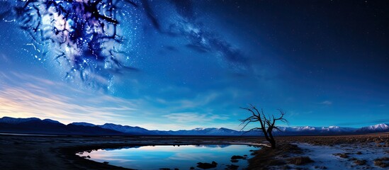 Wall Mural - stunning milky way captured in death valley national park with copy space image.