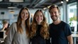 © Adobe Contributor - portrait of three young professionals smiling in an office