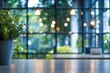 © Black Inspire - Blurred office interior background with a blurred desk and window light bokeh, a working space in the style of a modern business center for presentation or meeting.