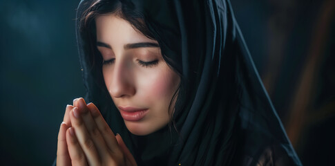 Wall Mural - A Muslim woman prays at night, her side profile illuminated by soft light. The background is dark, creating a peaceful night mood with ample copy space. Generative AI.