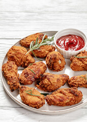 Canvas Print - american style fried chicken wings on a plate