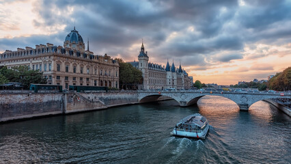 Canvas Print - Conciergerie and Seine River in Paris at sunset