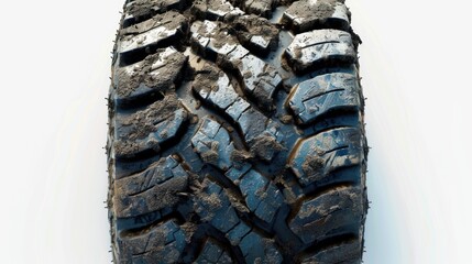 Wall Mural - A close-up shot of a tire on a white surface, suitable for automotive or industrial use