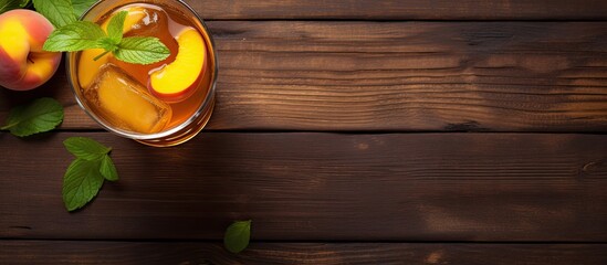 Aufkleber - Fresh homemade peach iced tea with mint on a wooden table. Creative banner. Copyspace image