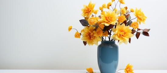 Poster - Yellow fall bouquet in blue vase isolated on white background. Creative banner. Copyspace image