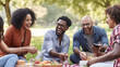 © Rabil - Friends laughing and enjoying a picnic