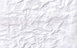 © Creative - Crumpled paper texture vector background. White wrinkled sheet. White creased paper background texture.