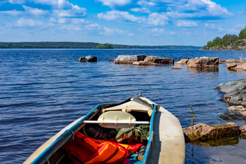 Wall Mural - Kayak on the shore of the lake. Quiet and serene scene of vacation spot for travel