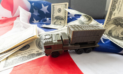 Wall Mural - War, military threat, military power concept. USA. military vehicle toy near american flag 