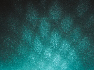 Wall Mural - light reflects blue shadows on a foam board in the dark for a minimalist abstract background.
