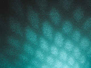 Wall Mural - light reflects blue shadows on a foam board in the dark for a minimalist abstract background.