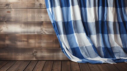 Wall Mural - Blue and white checkered curtain on a rustic wooden background.