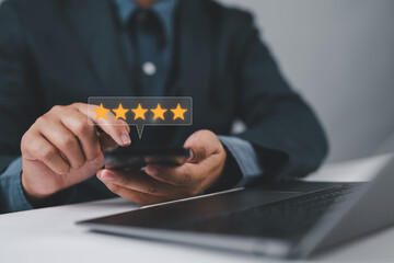 Customer satisfaction survey concept. Service experience rating, Satisfaction feedback review, good quality most. Person use smartphone to give excellent five-star ratings on virtual screen.