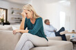 © Jadon Bester/peopleimages.com - Couch, couple and fight in home for annoyed, divorce or married people for argument. Disagreement, sofa and lounge for frustrated woman, affair or emotion in toxic relationship with mature partner