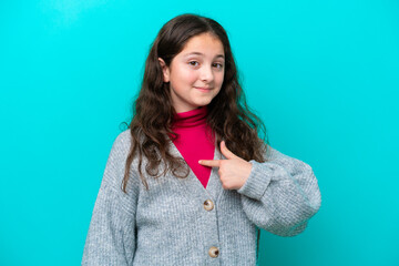 Canvas Print - Little girl isolated on blue background with surprise facial expression