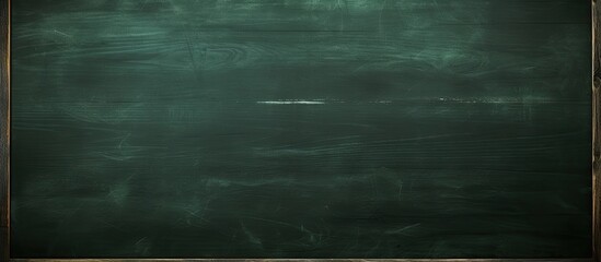 Sticker - Chalk marks on a green blackboard create an abstract texture, suitable for educational, dark wall backgrounds or learning concepts with a copy space image.