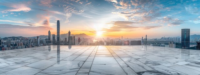 Wall Mural - Empty square marble floor with city skyline and sky at sunset, panoramic view of urban architecture