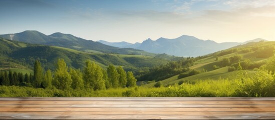 Poster - Wooden table with a scenic mountain view as a copy space image.