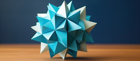Wall Mural - Close-up view of multicolored handmade modular origami balls (Kusudama) set against a vibrant yellow backdrop with selective focus on the intricate paper craft, offering copy space image.