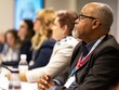 © mirifadapt - teaching on a seminar at convention center, medical team sitting and listening presenter