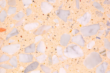 Leinwandbilder - A background with a lot of different colored rocks scattered all over it. The rocks are of various sizes and colors, creating a visually interesting and unique pattern