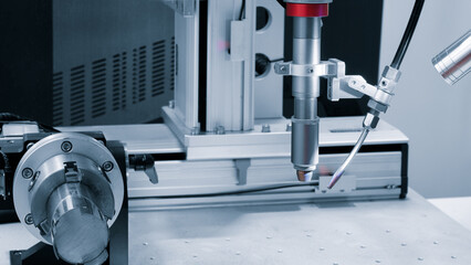Poster - Modern automatic welding machine, industrial concept background