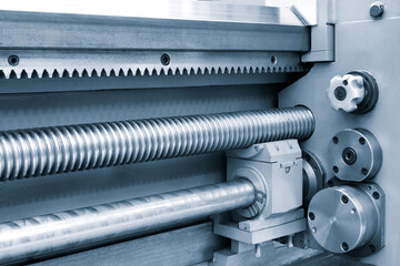 Aufkleber - A machine with a long metal rod and a gear, industrial concept background