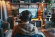 © Sandu - Man sitting in front of a tv with headphones