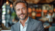 © Korea Saii - Portrait of a Smiling Male Entrepreneur Capturing the Charisma and Confidence of a Successful Business Owner, Radiating Self-Assuredness and Managerial Excellence Wallpaper Digital Art Poster