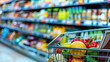 © 沈军 贡 - Close up of a shopping cart with food products in a supermarket