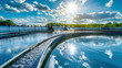 © Anoo - A water treatment plant under a captivating blue sky and fluffy clouds, diligently cleaning drains for a sustainable ecology