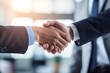 © MING - Businessmen handshake over blurred office background, concept of success and business relaxation with copy space for text stock photo, business shaking hands concept in the style of contest winner.