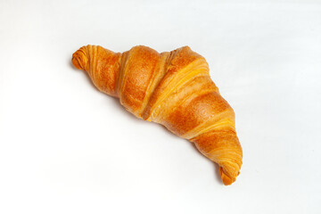 Wall Mural - Fresh croissants isolated on white background.