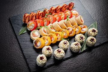 Wall Mural - sushi set on the black background