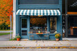© tiena - Local cafe exterior. Small business. Summer coffee shop without