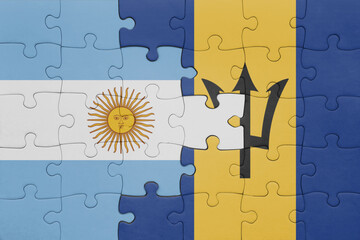 Wall Mural - puzzle with the colourful national flag of barbados and flag of argentina.