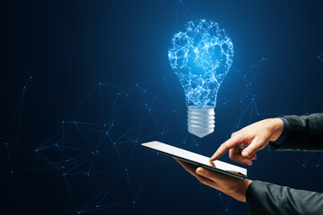 Aufkleber - A digital light bulb with a brain pattern above a tablet, symbolizing innovation on a dark blue network background