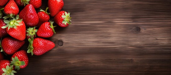 Poster - Top view of strawberries displayed on wooden surface with copy space image.